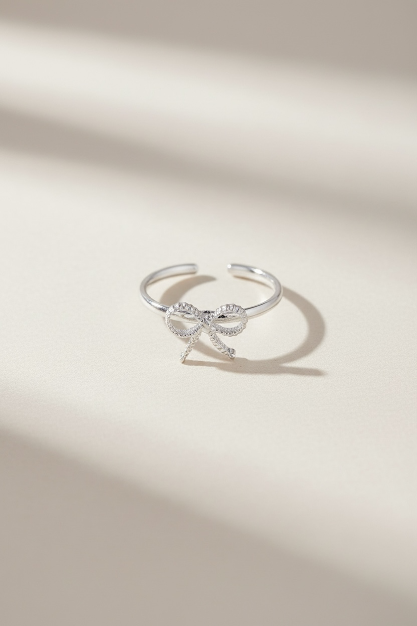 Bow ring guld/silver